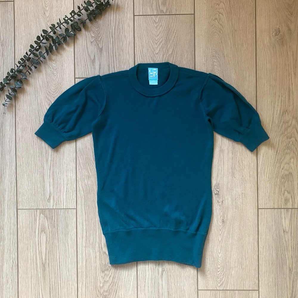 Barney’s NY cashmere sweater shirt sleeve